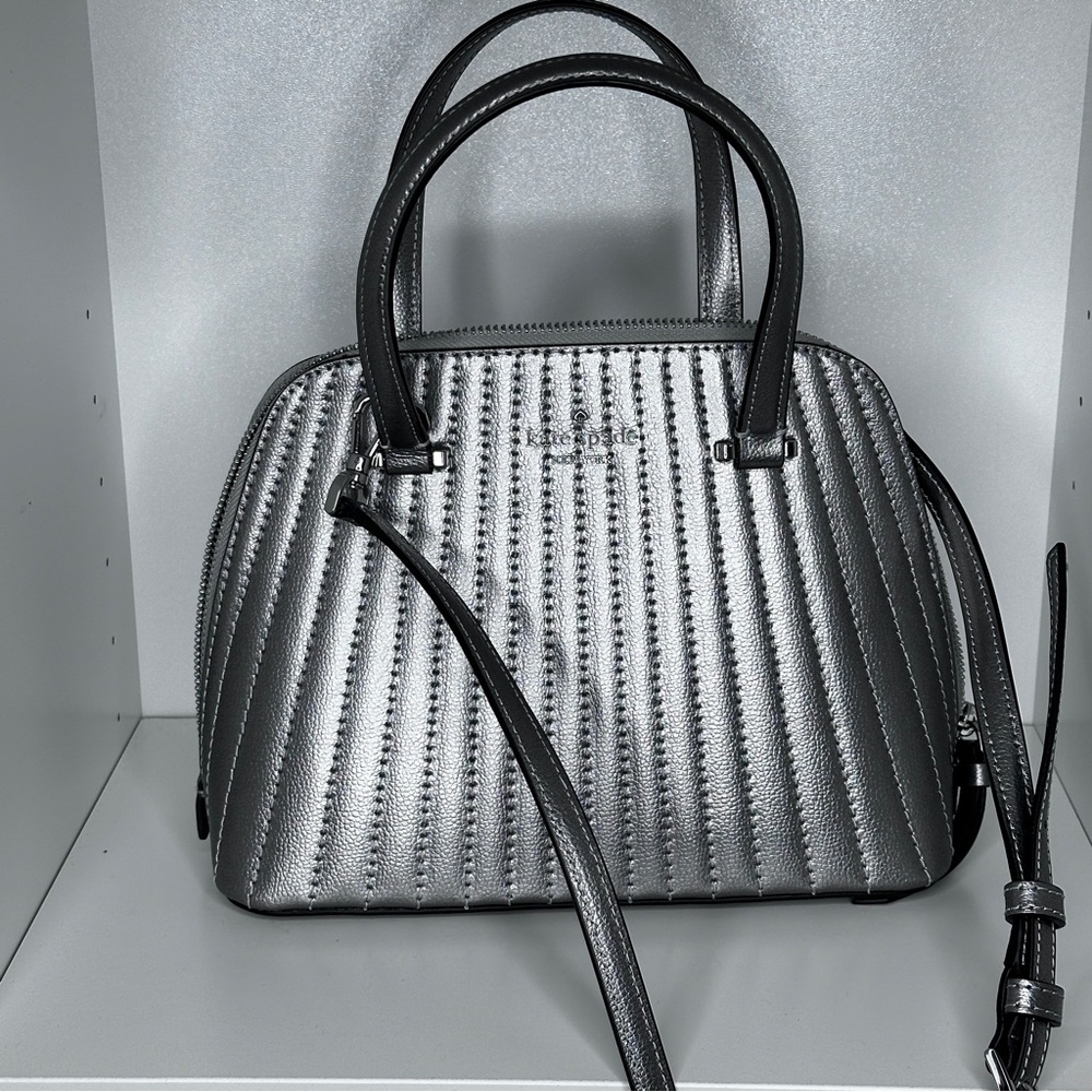 Like new no tags.  Art deco feel
